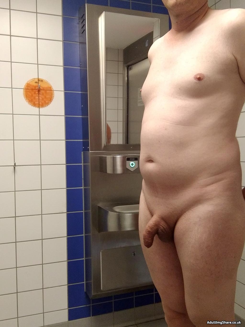 Nude in a public toilet